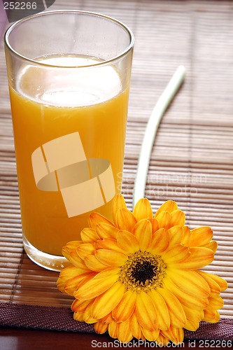 Image of Orange Juice and Flower