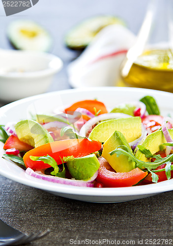 Image of Avocado with Pomegranate and Rocket salad