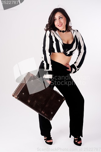 Image of Pretty woman with suitcase