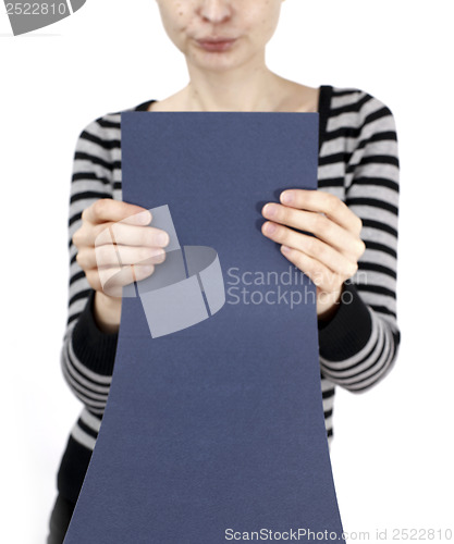 Image of Woman holding a paper