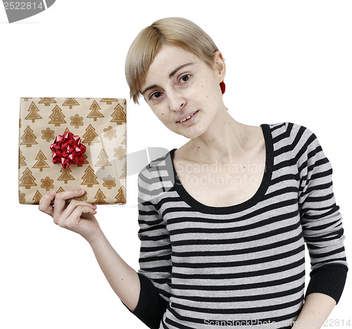 Image of Young woman holding a present