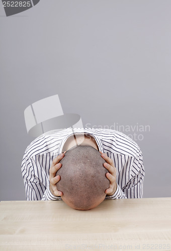 Image of Man at desk