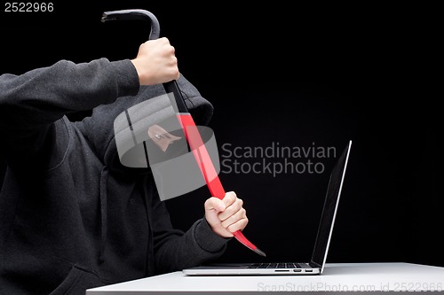 Image of Computer hacker in a balaclava