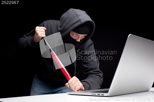 Image of Computer hacker in a balaclava