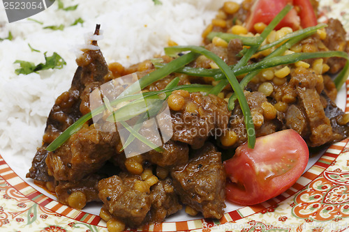 Image of Lamb curry with split peas closeup