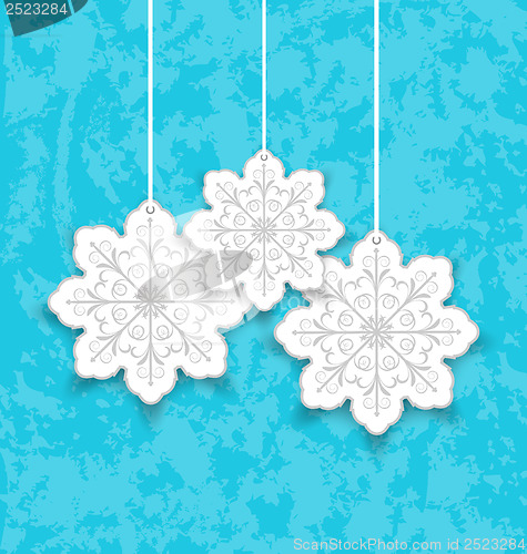 Image of Set Christmas paper snowflakes on blue grunge background