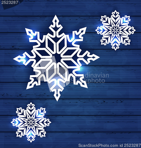 Image of Set snowflakes on wooden background