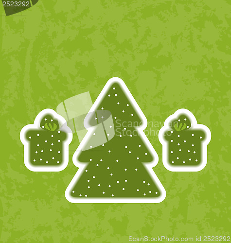 Image of Green paper cut-out christmas tree fnd gifts