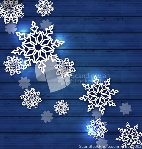 Image of Christmas set snowflakes on wooden background