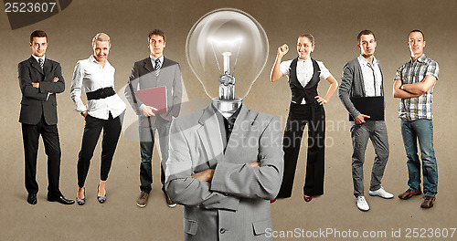 Image of Business Team With Lamp Head