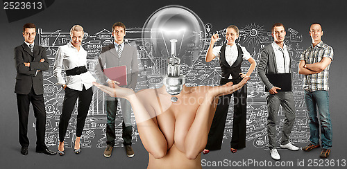 Image of Business Team With Lamp Head