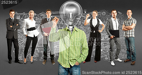 Image of Business Team With Lamp Head