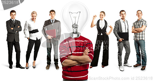 Image of Business Team With Lamp Head