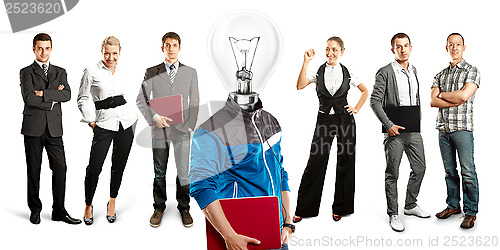 Image of Business Team With Lamp Head