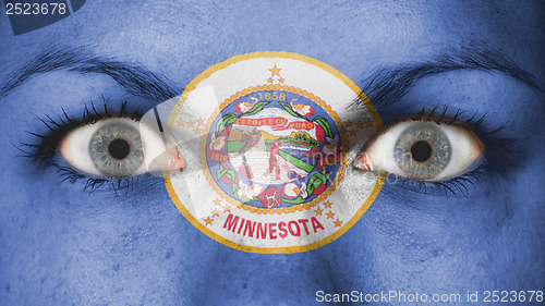 Image of Close up of eyes with flag