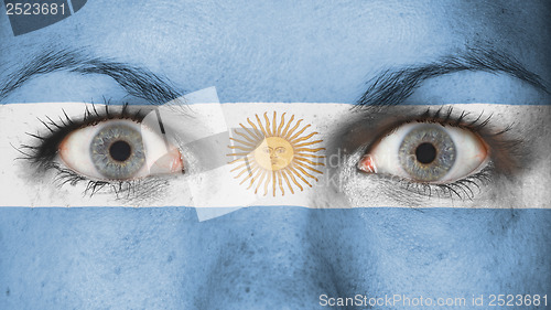 Image of Close up of eyes with flag