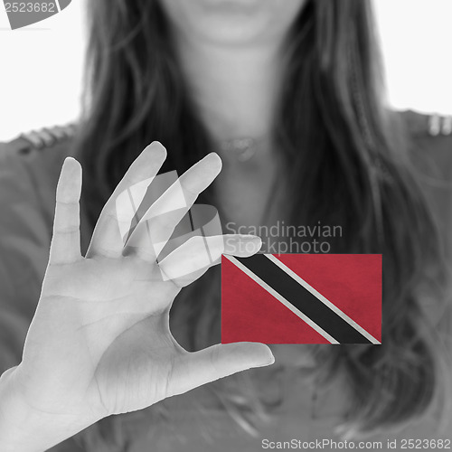 Image of Woman showing a business card