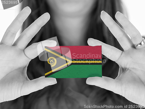 Image of Woman showing a business card