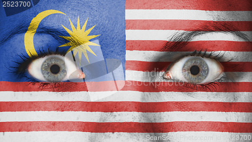 Image of Close up of eyes with flag