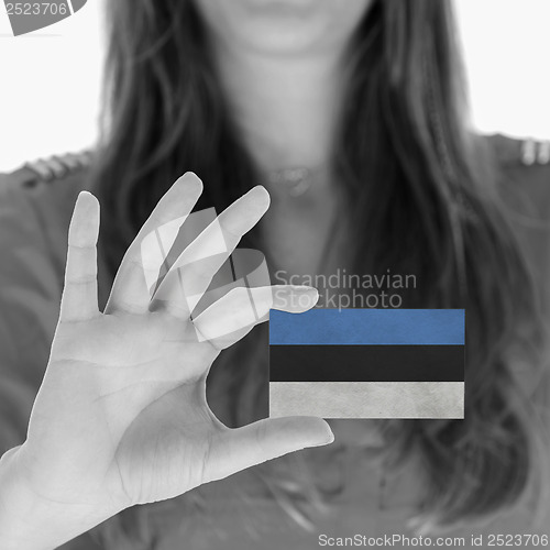 Image of Woman showing a business card