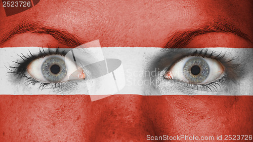 Image of Close up of eyes with flag