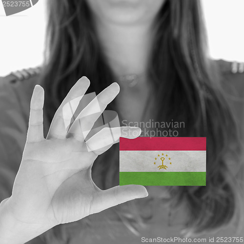 Image of Woman showing a business card