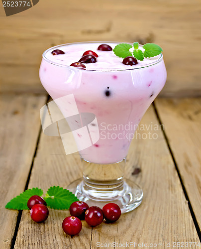 Image of Yogurt thick with cranberries on the board