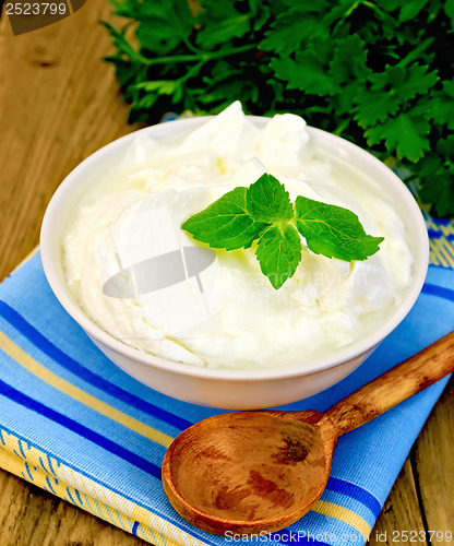 Image of Yogurt in a white bowl with mint