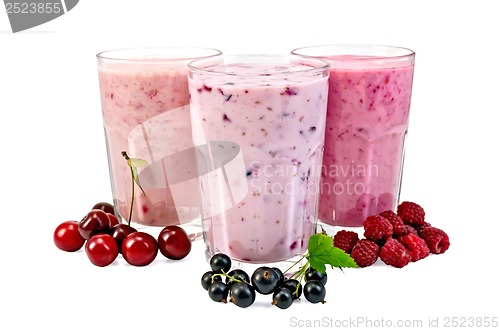 Image of Milk shakes with berries in glass