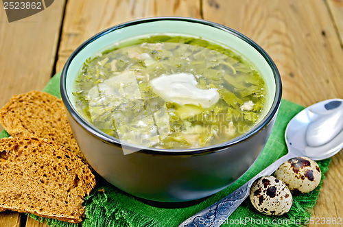 Image of Soup green of herbs on the board