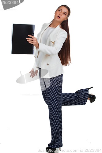 Image of Attractive cheerful businesswoman with folder