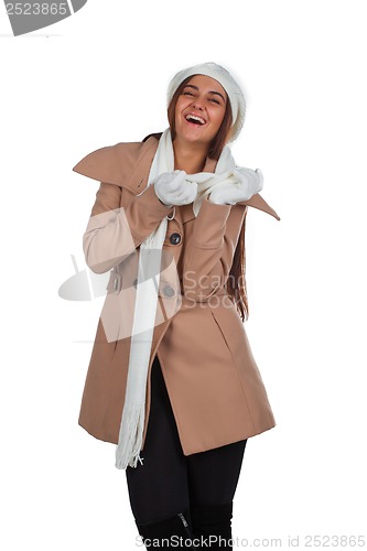 Image of Woman in outrwear, white scarf and hat