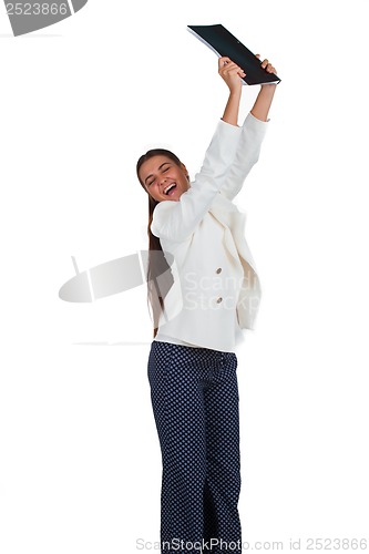 Image of Attractive cheerful businesswoman with folder