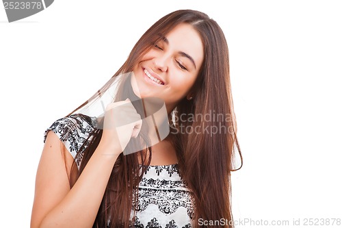 Image of Attractive young woman posing in studio