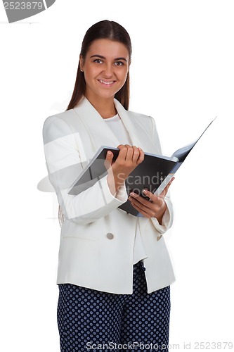 Image of Attractive cheerful businesswoman with folder