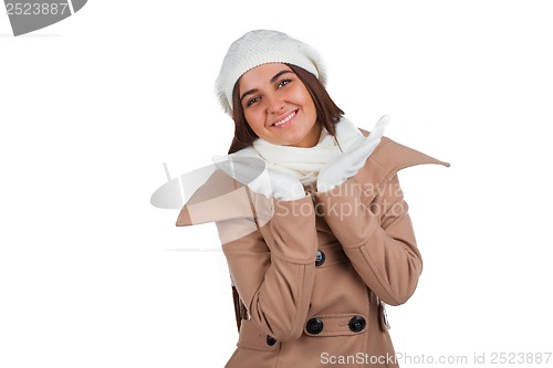 Image of Woman in outrwear, white scarf and hat