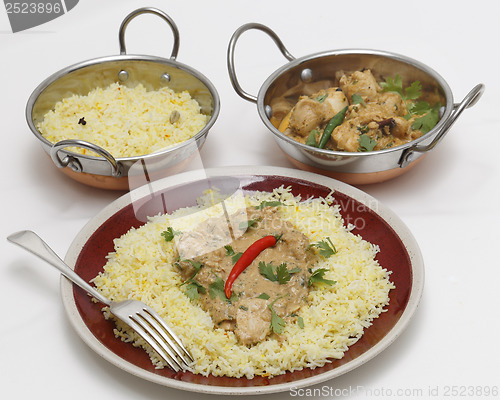 Image of Pasanda chicken curry with serving kadai bowls