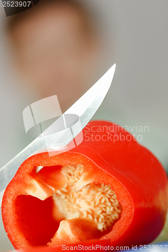 Image of Red pepper and a knife