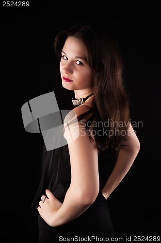 Image of glamorous young woman in black