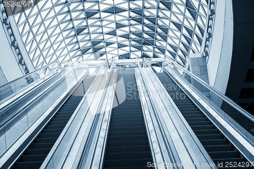 Image of Moving escalator in the business center