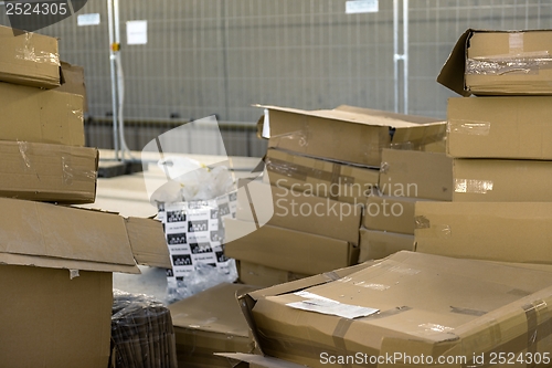 Image of Opened cardboard box in a building