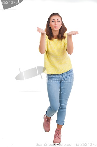 Image of Young girl sending air kiss