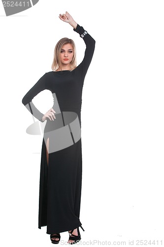 Image of Portrait of trendy blonde woman in black dress