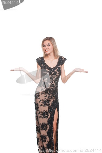 Image of Portrait of trendy young woman in guipure dress