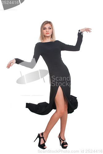 Image of Portrait of trendy blonde woman in black dress