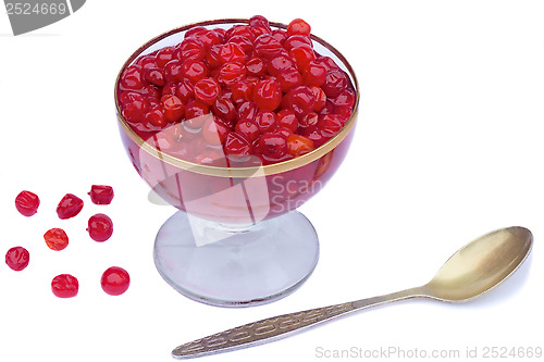 Image of Viburnum berries in syrup on a white background.