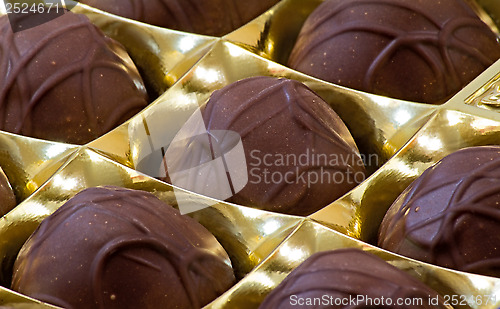 Image of Chocolate candies in shiny package.