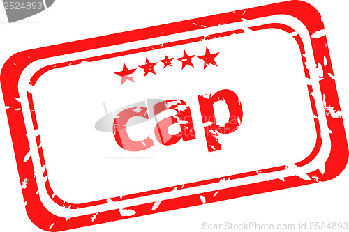 Image of cap on red rubber stamp over a white background