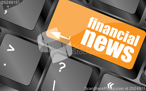 Image of financial news button on computer keyboard