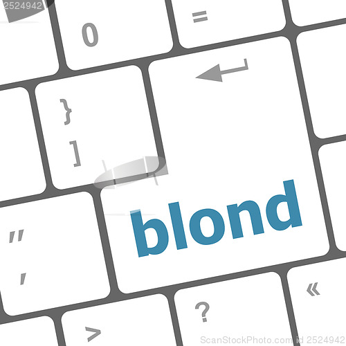 Image of blond word on keyboard key, notebook computer button